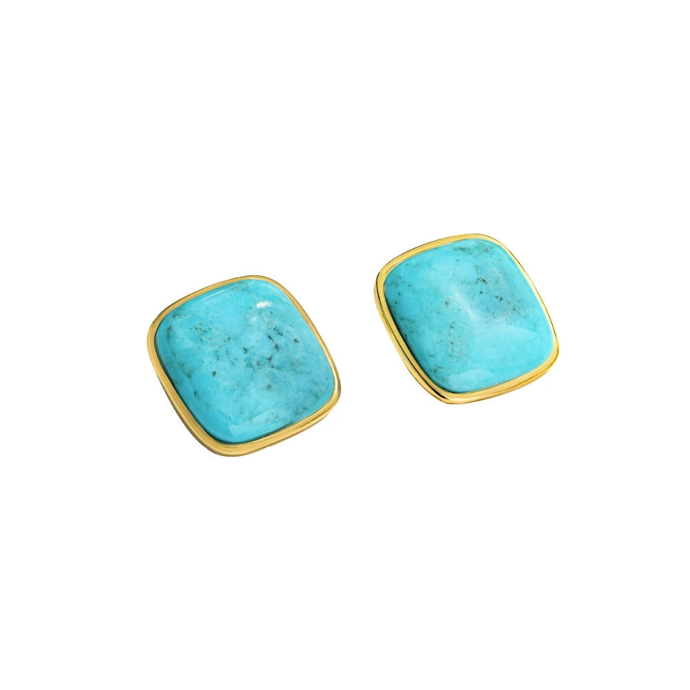 Pair of gold plated stud earrings featuring square turquoise gemstones with natural patterns