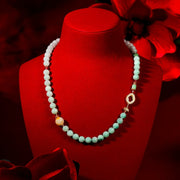 Floating Jade, Flowing Light – Oriental Scroll Jadeite Necklace - Veilgem