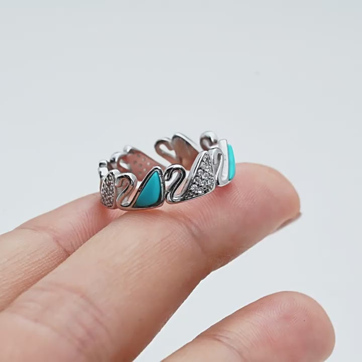 Load video: Swan Embrace Turquoise Ring